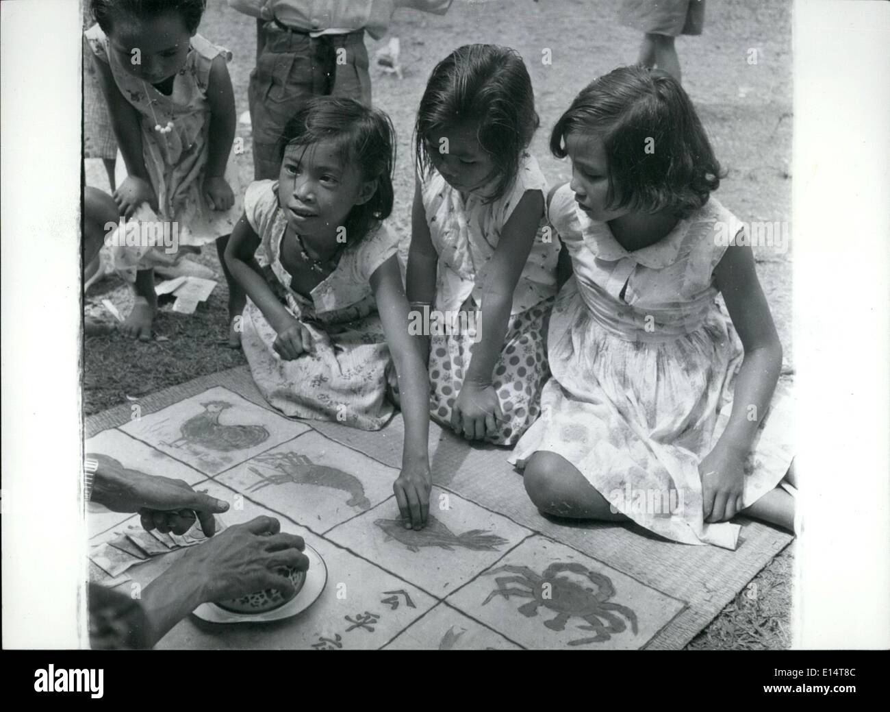 Apr. 18, 2012 - Gambling is a national native disease in Brunei and N Borneo. Evan the children have there own form of it. Stock Photo