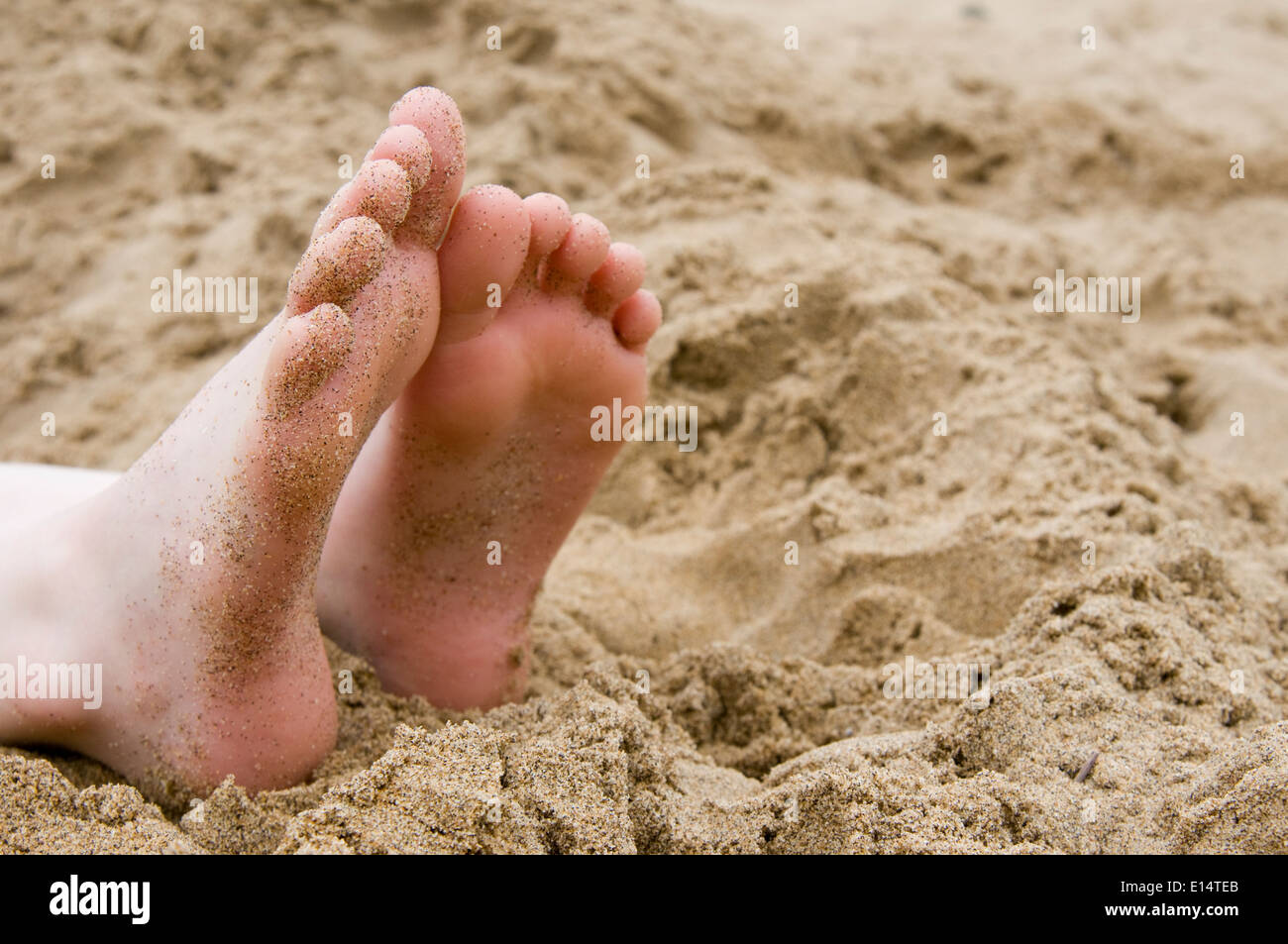 sandy feet Stock Photo
