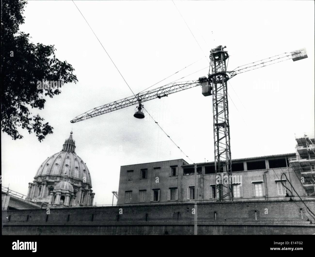 Apr. 18, 2012 - The St. Peter's dome is moving as the Vatican changes the see?: It is only a superimpsition of a crane of a yard near St. Peter. Stock Photo