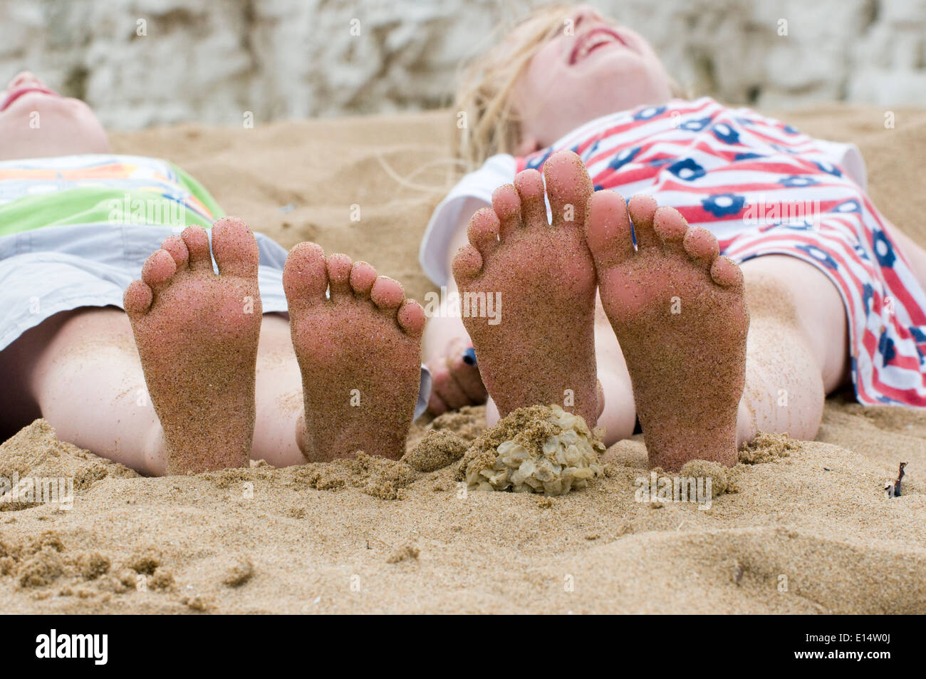 little feet on the sandy beach Stock Photo