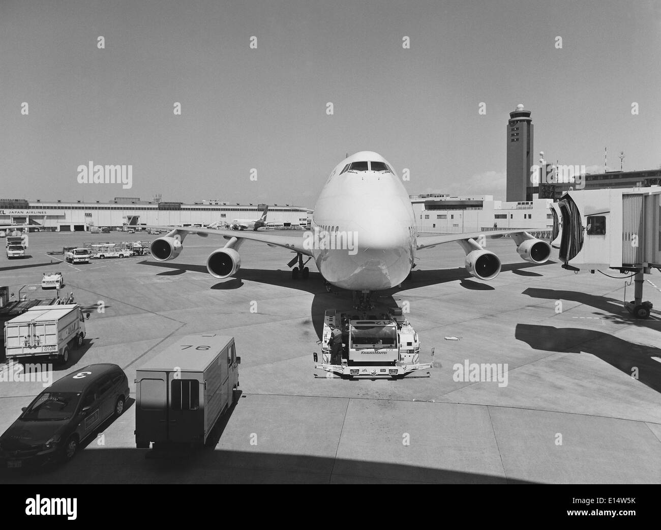 Airplane being towed at Narita airport in Tokyo, Japan. Stock Photo