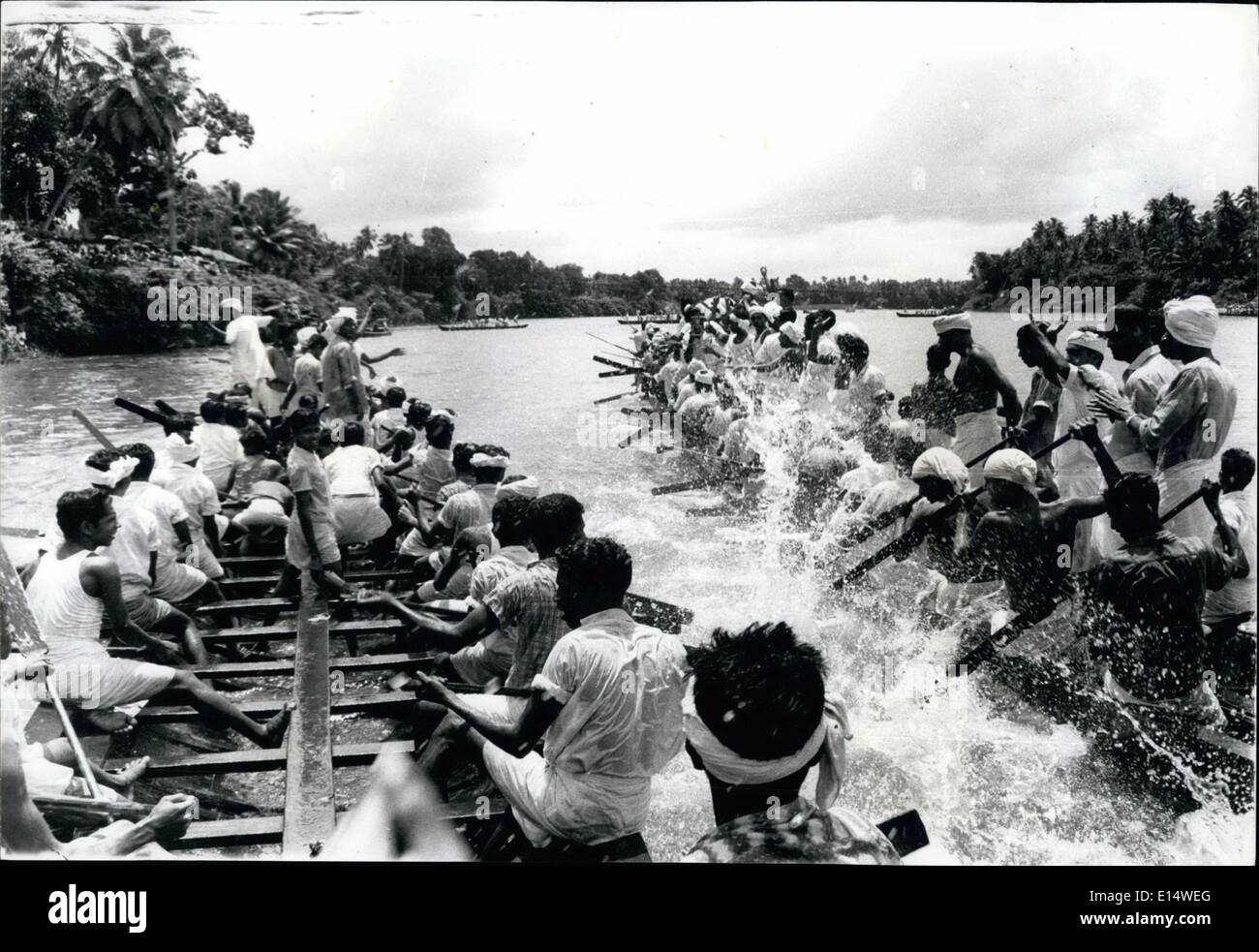 Apr. 18, 2012 - Harvest Festival in ''The Land of the Gods'' Kerala Celebrates on Water:A hundred miles from Trivanderum, Kerala, India is ''The Venice of the East''. There, centred on a village of Aranmula, thousands annually celebrate a form of water harvest festival, another river Pamba. Highlight of this ancient festival is a pageant of 30 snake-boats which are rowed from the village downstream to an temple to Krishna and back again seven time to the encouragement of handclaps from thousands of spectators from the neighbouring villages each of which owns a boat Stock Photo