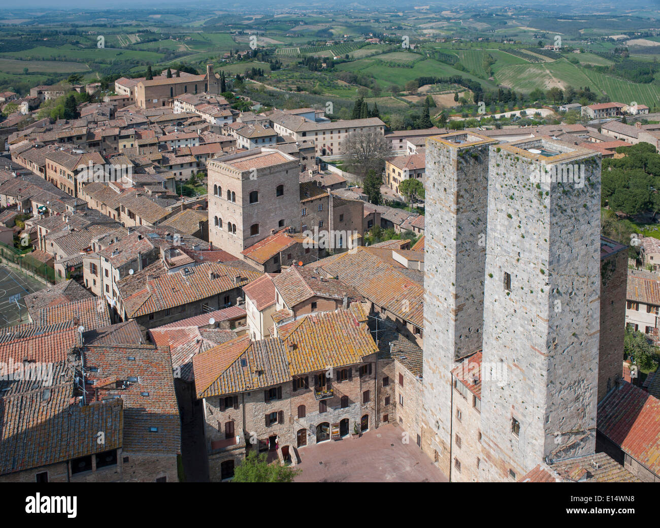 Historic centre with the Torri dei Salvucci, twin towers or Torri Gemelli, view from the Torre Grossa tower in San Gimignano Stock Photo