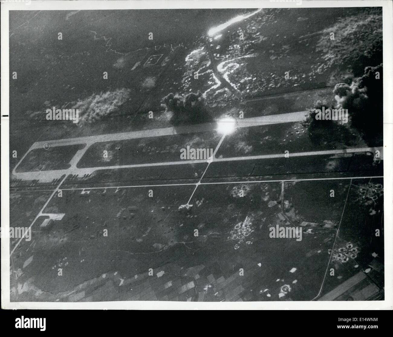 Apr. 18, 2012 - Secondary Explosion: A secondary explosion is visible in this strike photo taken during a strike on North Vietnam's Phu Yen Airfield, 18 miles northwest of Hanoi on December 20, 1967.Official U.S. Air forces photo released by the department of defse, Washington, c., Jan-8,1968. Previously released by the U.S. Military assistance command, Vietnam. Stock Photo