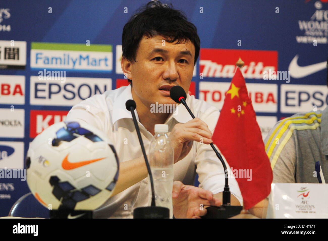 Ho Chi Minh City, Vietnam. 22nd May, 2014. Hao Wei, head coach of China, speaks at the press conference after semi-final against Japan during the 2014 Asian Football Confederation (AFC) Women's Asian Cup at Thong Nhat Stadium in Ho Chi Minh City, Vietnam, on May 22, 2014. Japan advanced to final after beating China 2-1. © Nguyen Le Huyen/Xinhua/Alamy Live News Stock Photo