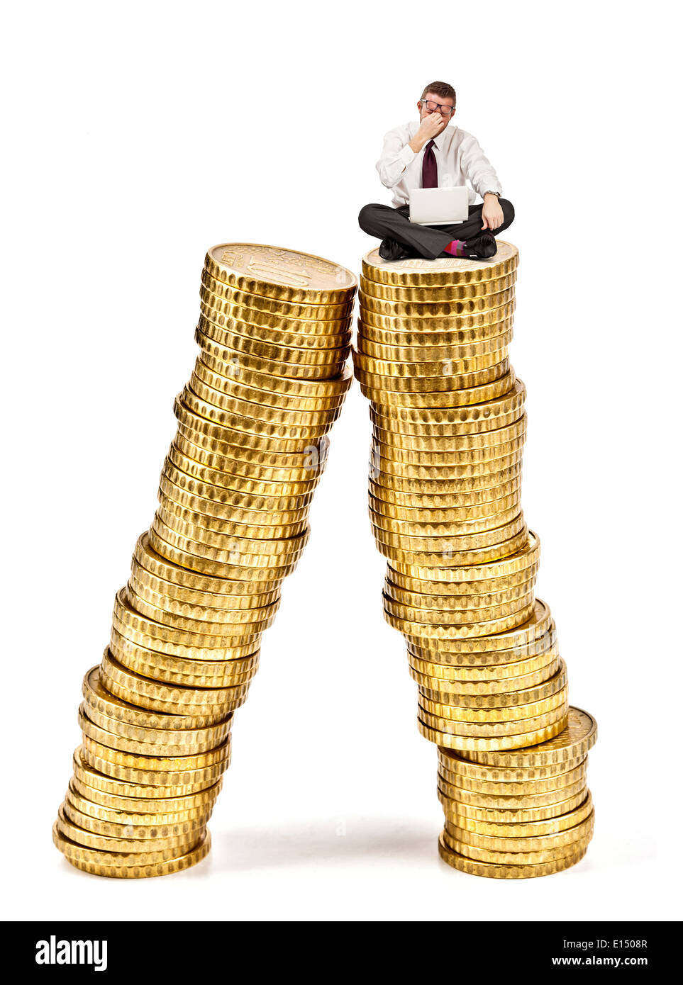stressed man on pile of euro coin Stock Photo