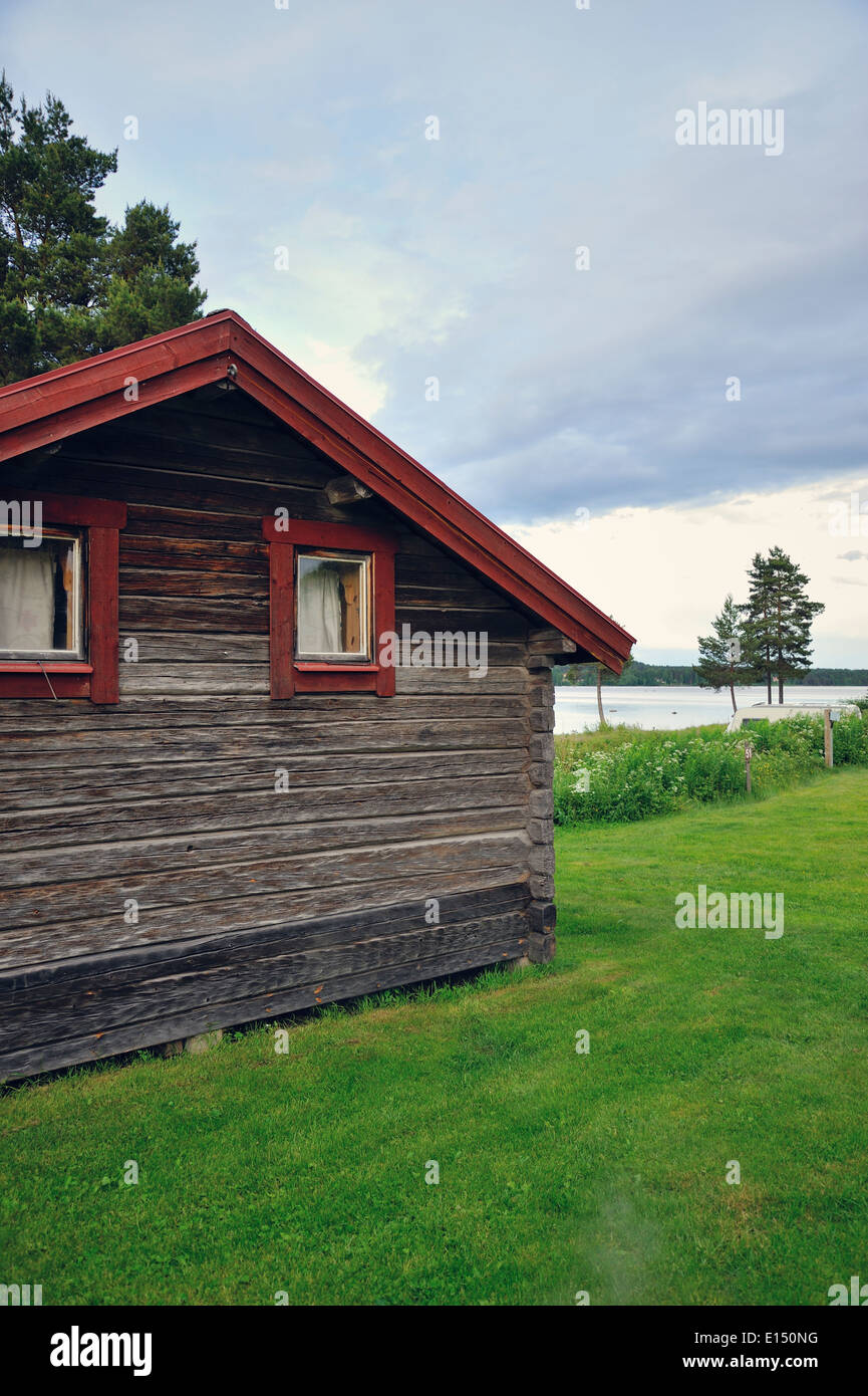 Sweden, Leksand, Frame house at Lake Siljan Stock Photo