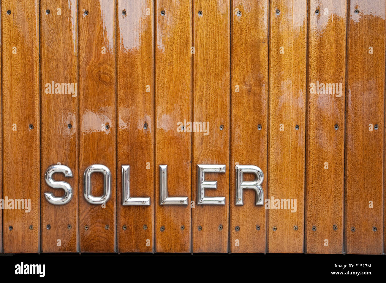 Detail from side of vintage wooden narrow gauge train carriage. Soller/Palma Railway, Mallorca Stock Photo