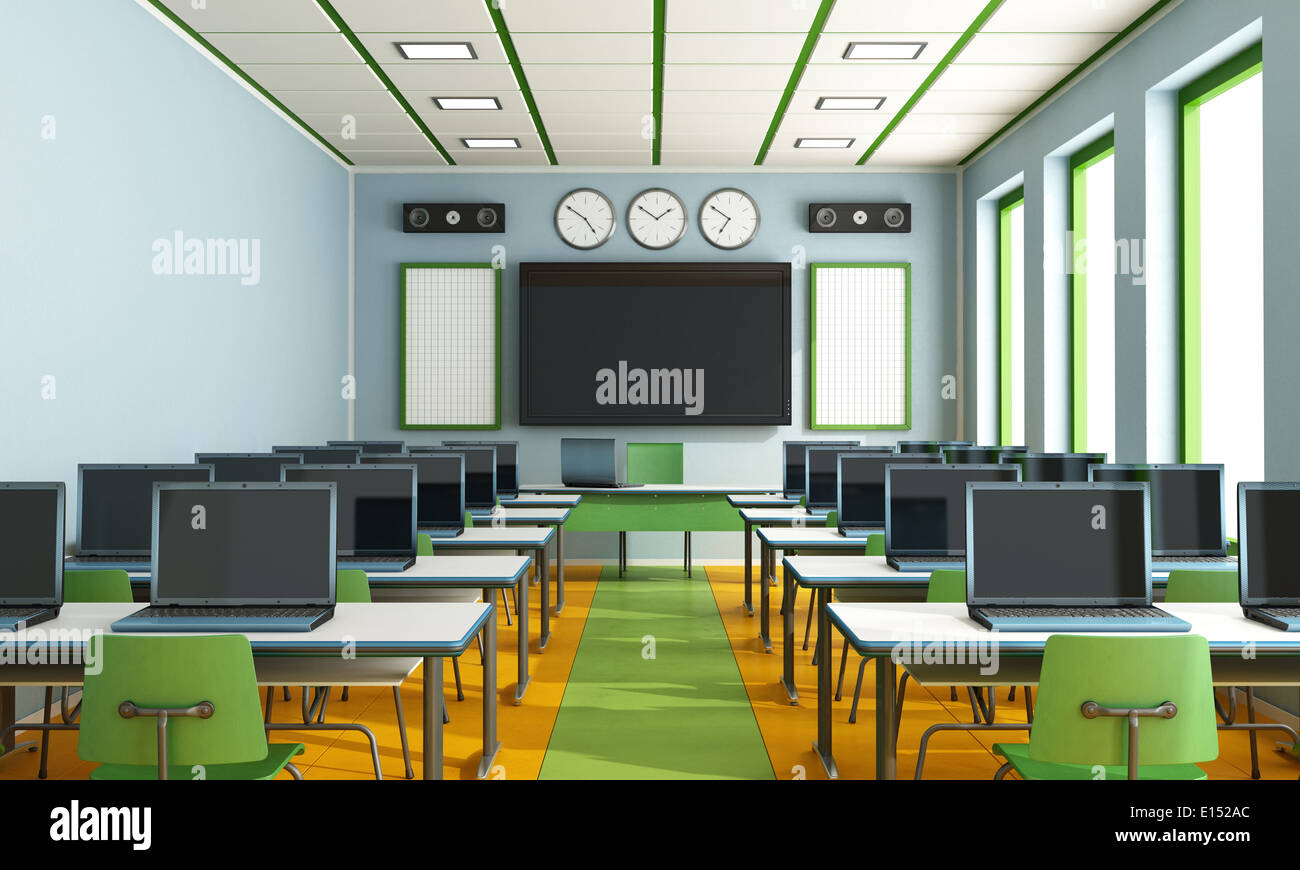 Multimedia classroom with computers, screen and speakers Stock Photo
