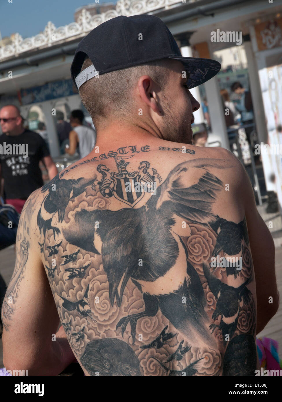 The tattooed back of a Newcastle United football supporter Stock Photo -  Alamy