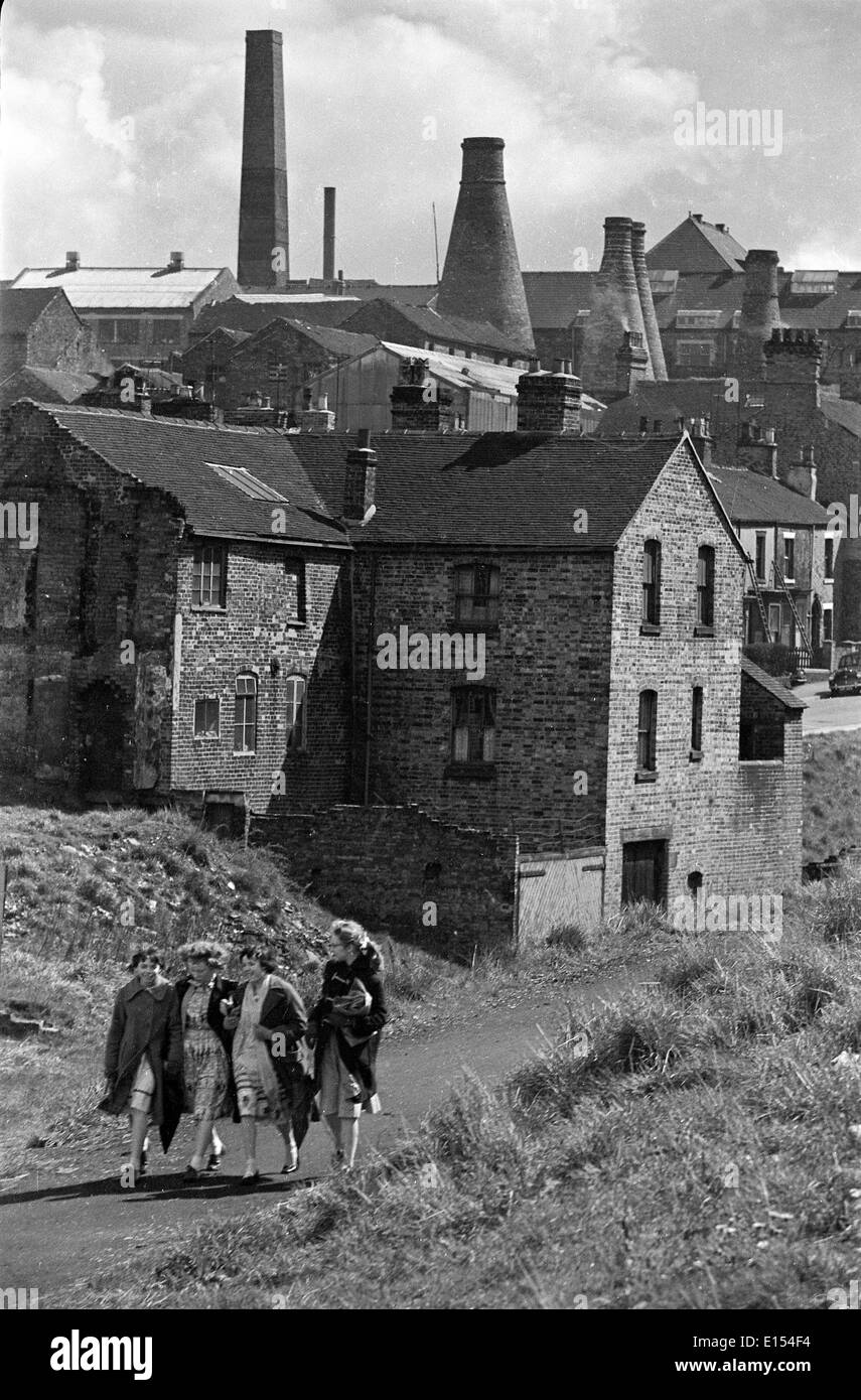 The Potteries in Stoke on Trent girls walking home from work 1950s Britain Uk Stock Photo