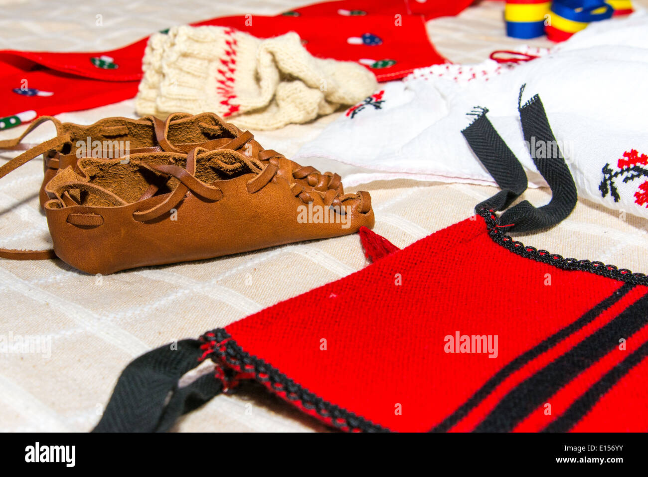 Traditional costume from Romania, ethnic symbol with romanian flag Stock Photo