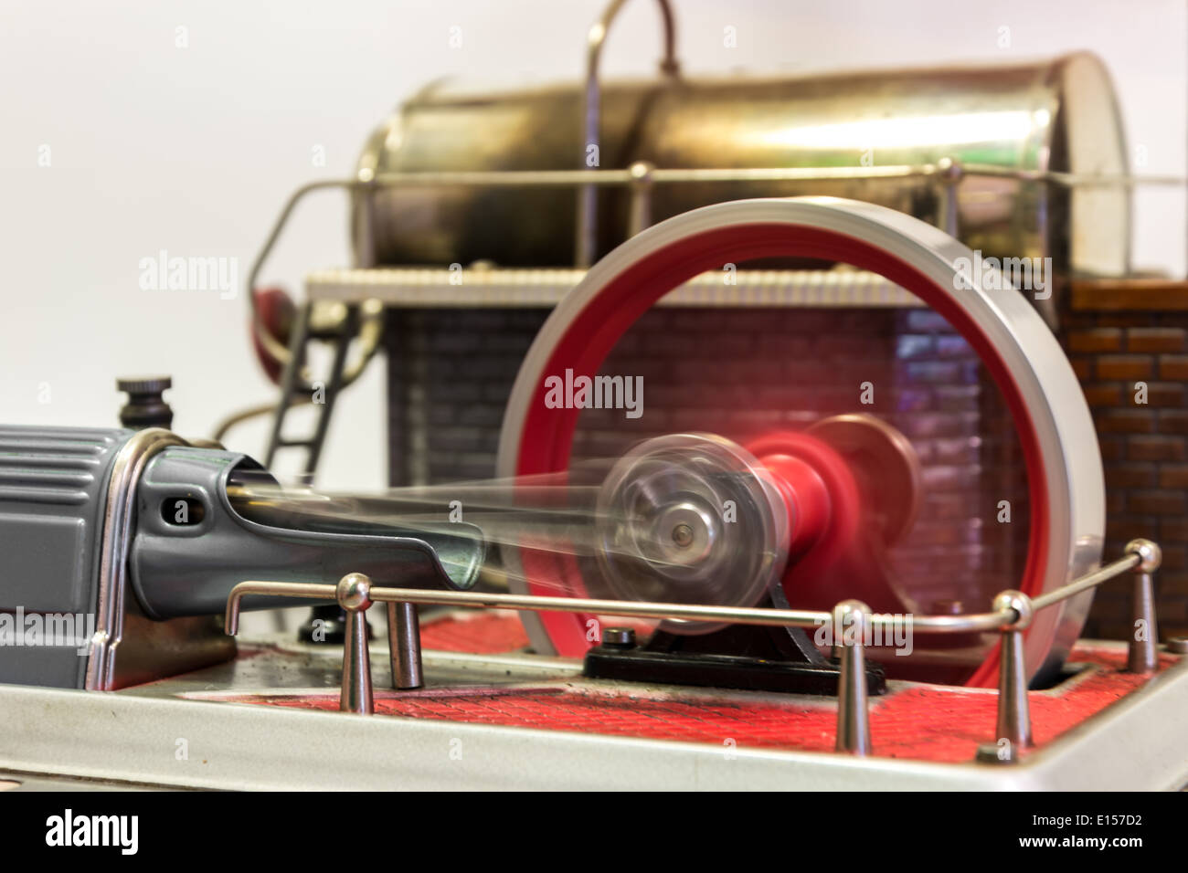 Close up of a spinning flywheel of a steam engine Stock Photo Alamy