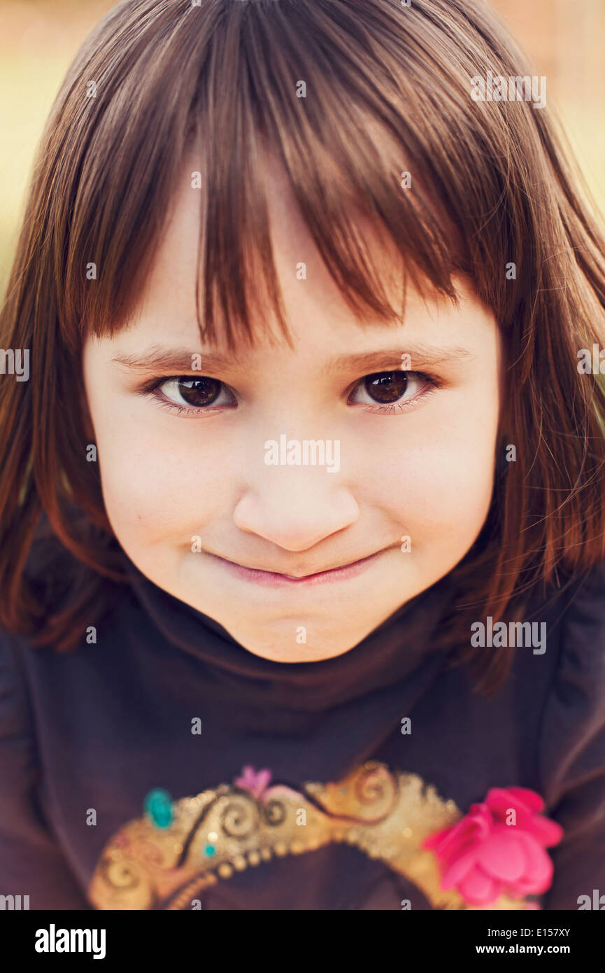 Girl with funny facial expression Stock Photo