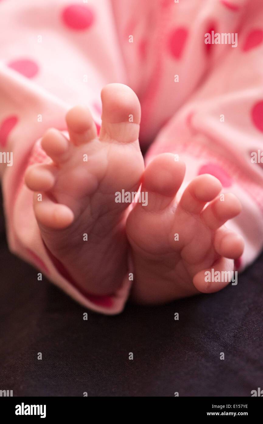 A close-up of tiny baby feet Stock Photo