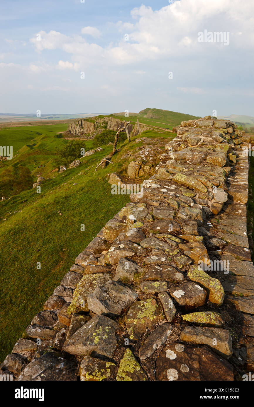 looking down from a section of hadrians wall at walltown crags northumberland uk Stock Photo