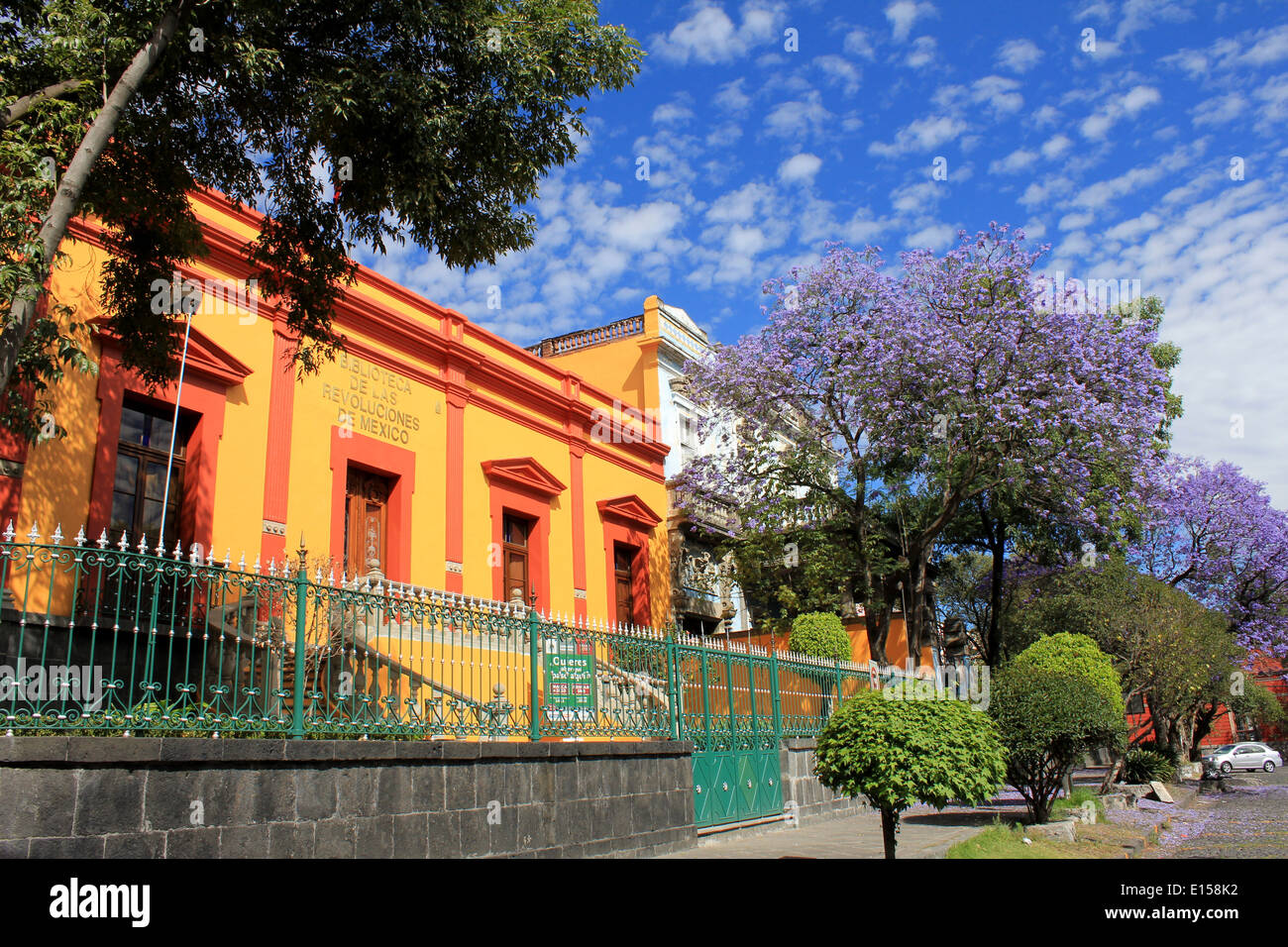 Yellow building (Library of Mexican Revolutions) in San Angel, Mexico City Stock Photo