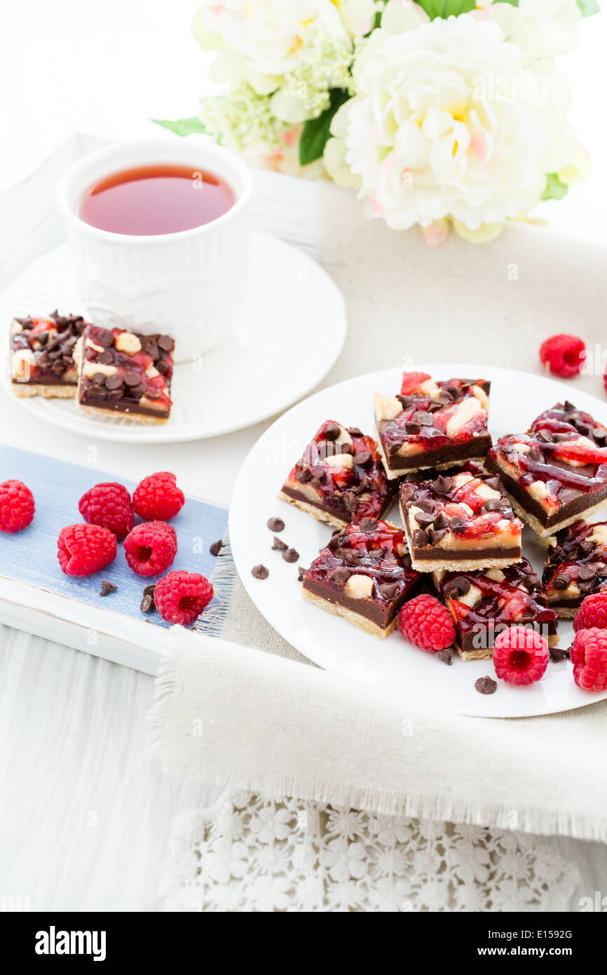 Fresh chocolate raspberry squares cut in bite size Stock Photo - Alamy