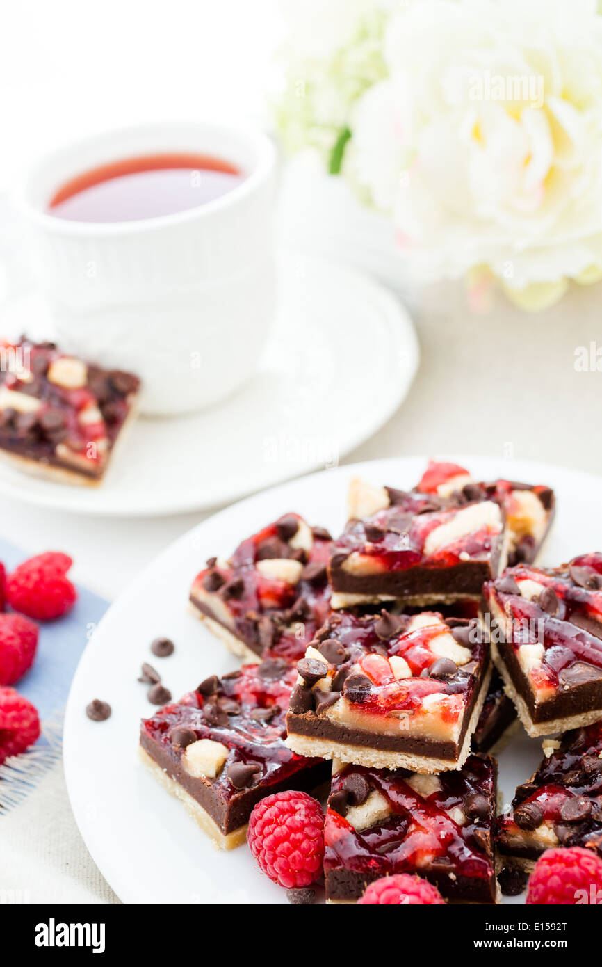Fresh chocolate raspberry squares cut in bite size Stock Photo - Alamy
