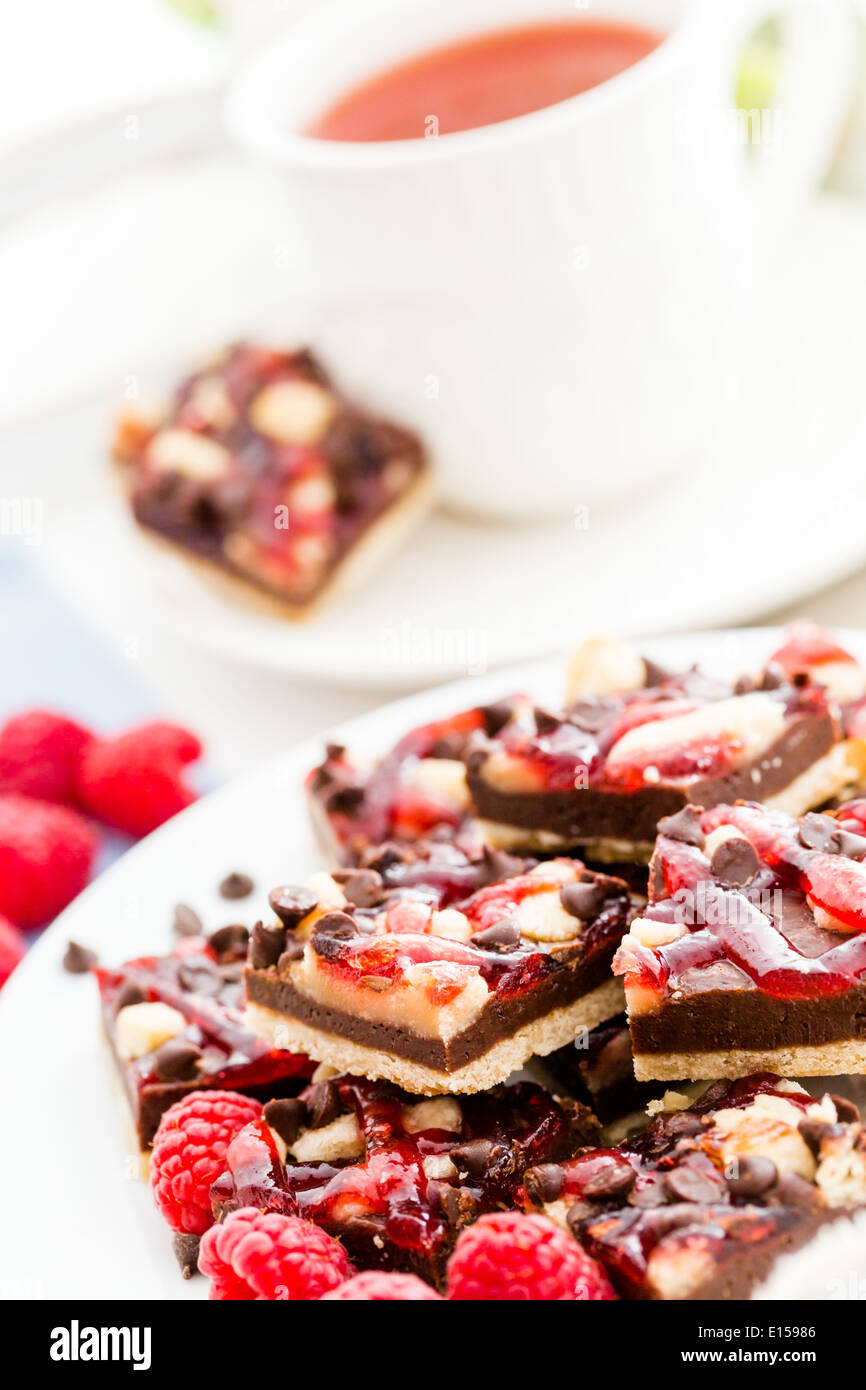 Fresh chocolate raspberry squares cut in bite size Stock Photo - Alamy
