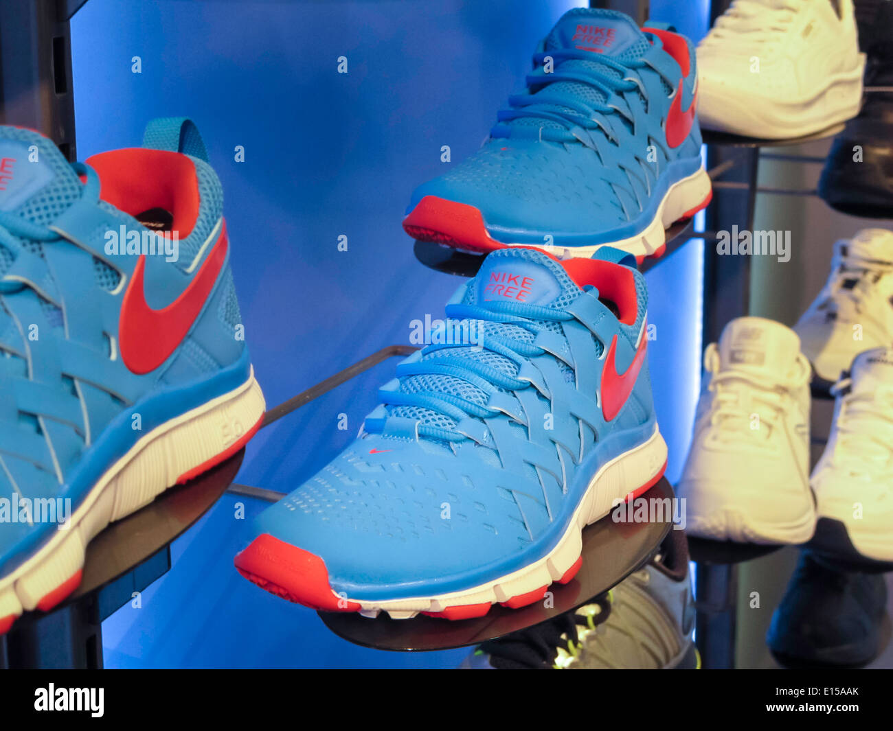 Athletic Footwear Wall with Nikes  with Swoosh Logo,, Modell's Sporting Goods Store Interior, NYC Stock Photo