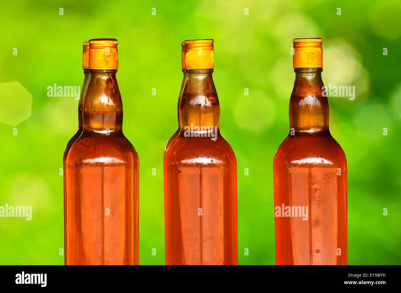 Honey in glass bottle stock photo alamy