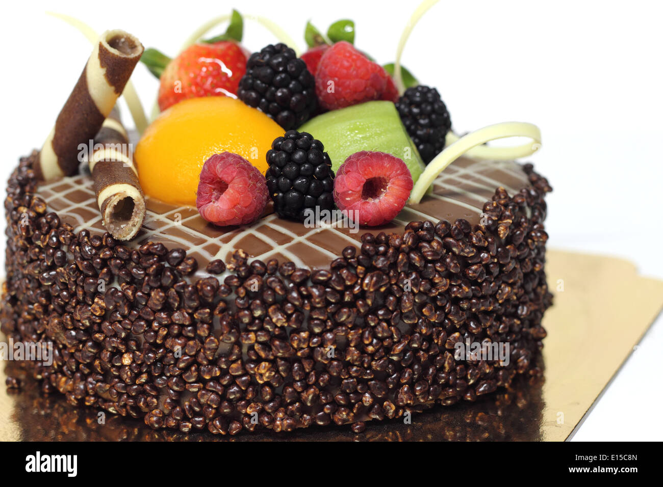 A Delicious chocolate strawberry cake with chocolate ganache. Stock Photo