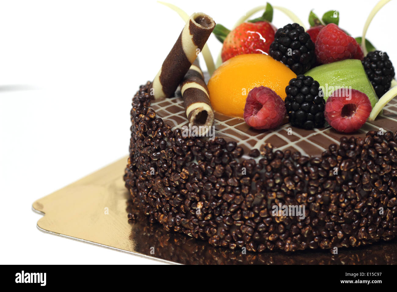 Delicious chocolate strawberry cake with chocolate ganache. Stock Photo