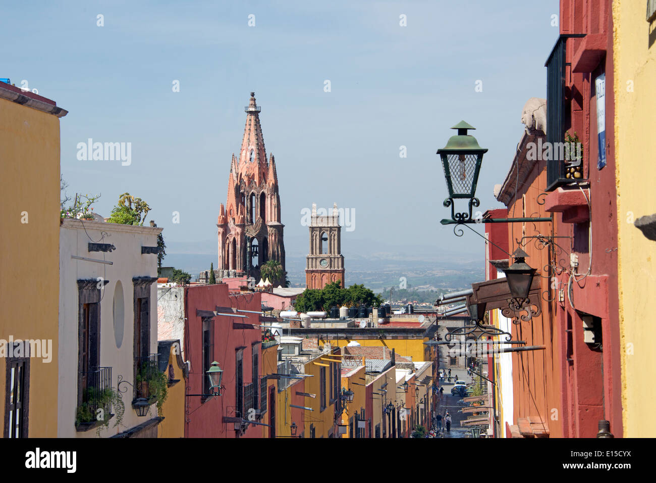 Steep cobbled stone street with view Parroquia San Miguel de Allende