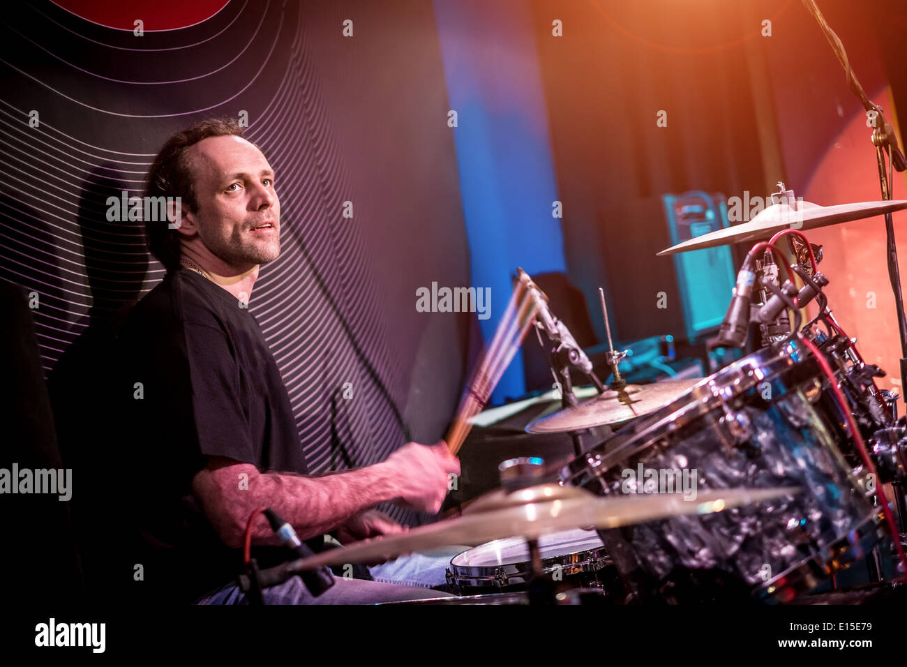 Musician playing drums on stage, rock music concert Stock Photo Alamy