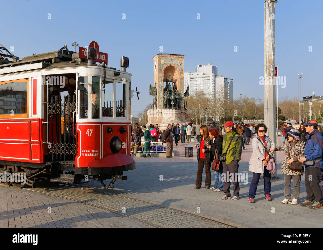 Turkey, Istanbul, Beyoglu, Taksim Meydani or square, Historical tram and Mustafa Kemal Atatuerk Memorial in the background Stock Photo