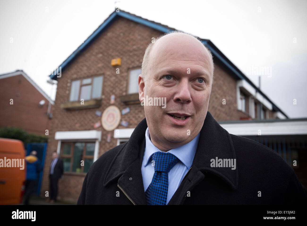 Conservative Party politician and British government minister Chris Grayling, pictured outside a community centre, Wythenshawe. Stock Photo