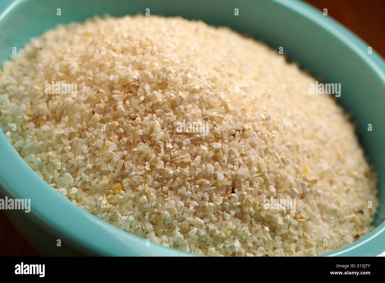 uncooked hominy grits Stock Photo