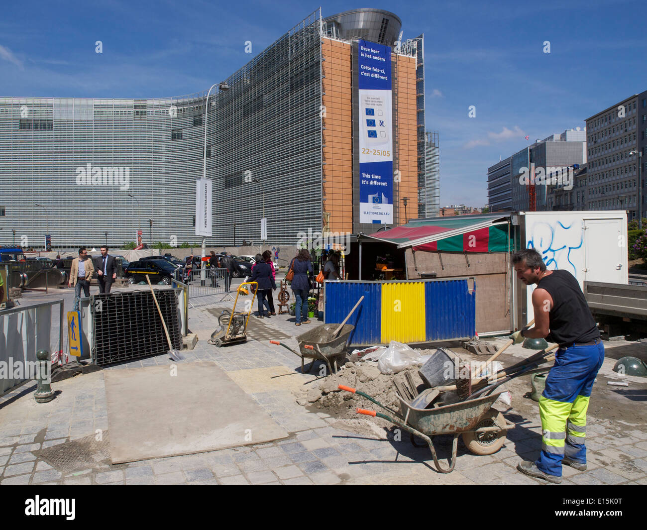Construction worker at European Commission Berlaymont building in Brussels, Belgium Stock Photo