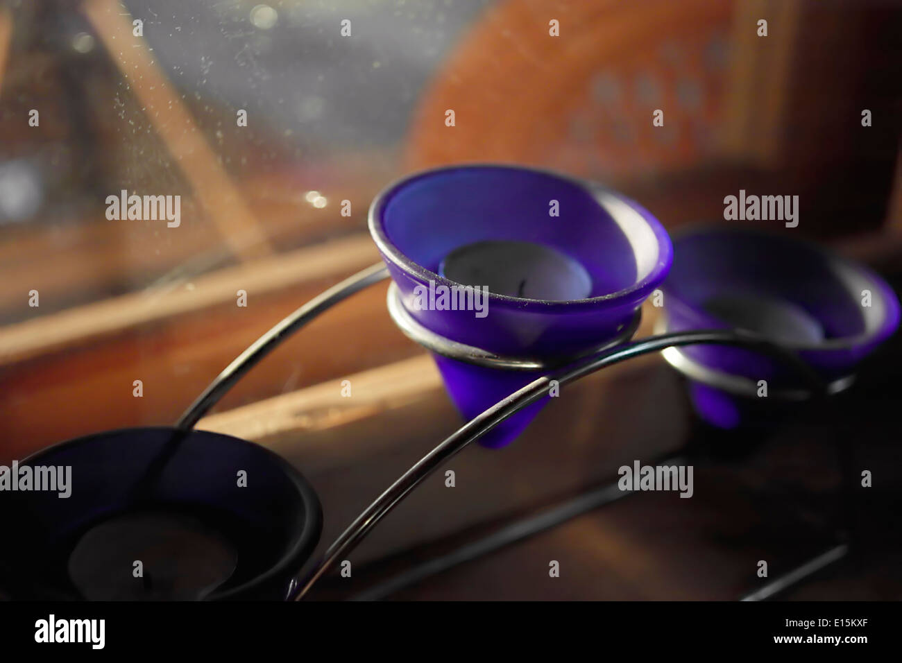 three candle holders Stock Photo Alamy