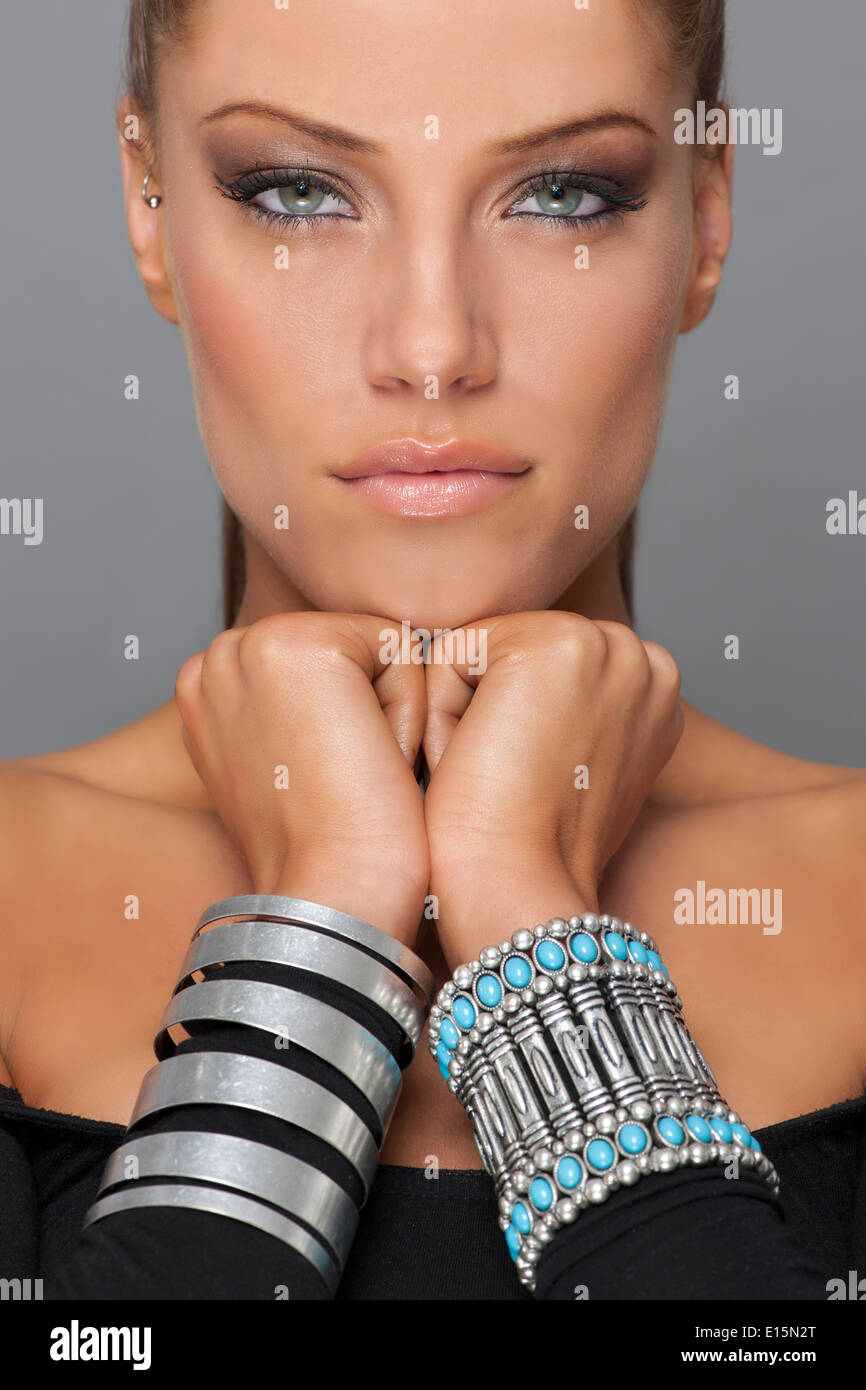 woman beauty model hands under chin Stock Photo