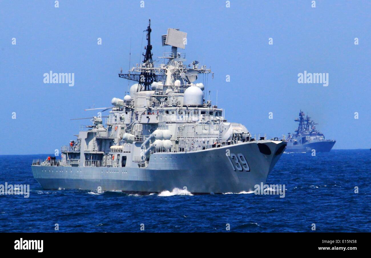 East China Sea. 23rd May, 2014. Chinese and Russian naval ships take part in the joint naval drill on East China Sea, May 23, 2014. The Chinese and Russian navies staged exercises, including joint escort drill, joint aircraft identification exercise and air defense and maritime assault drills, on the East China Sea on Friday to simulate anti-piracy operations. Credit:  Zha Chunming/Xinhua/Alamy Live News Stock Photo