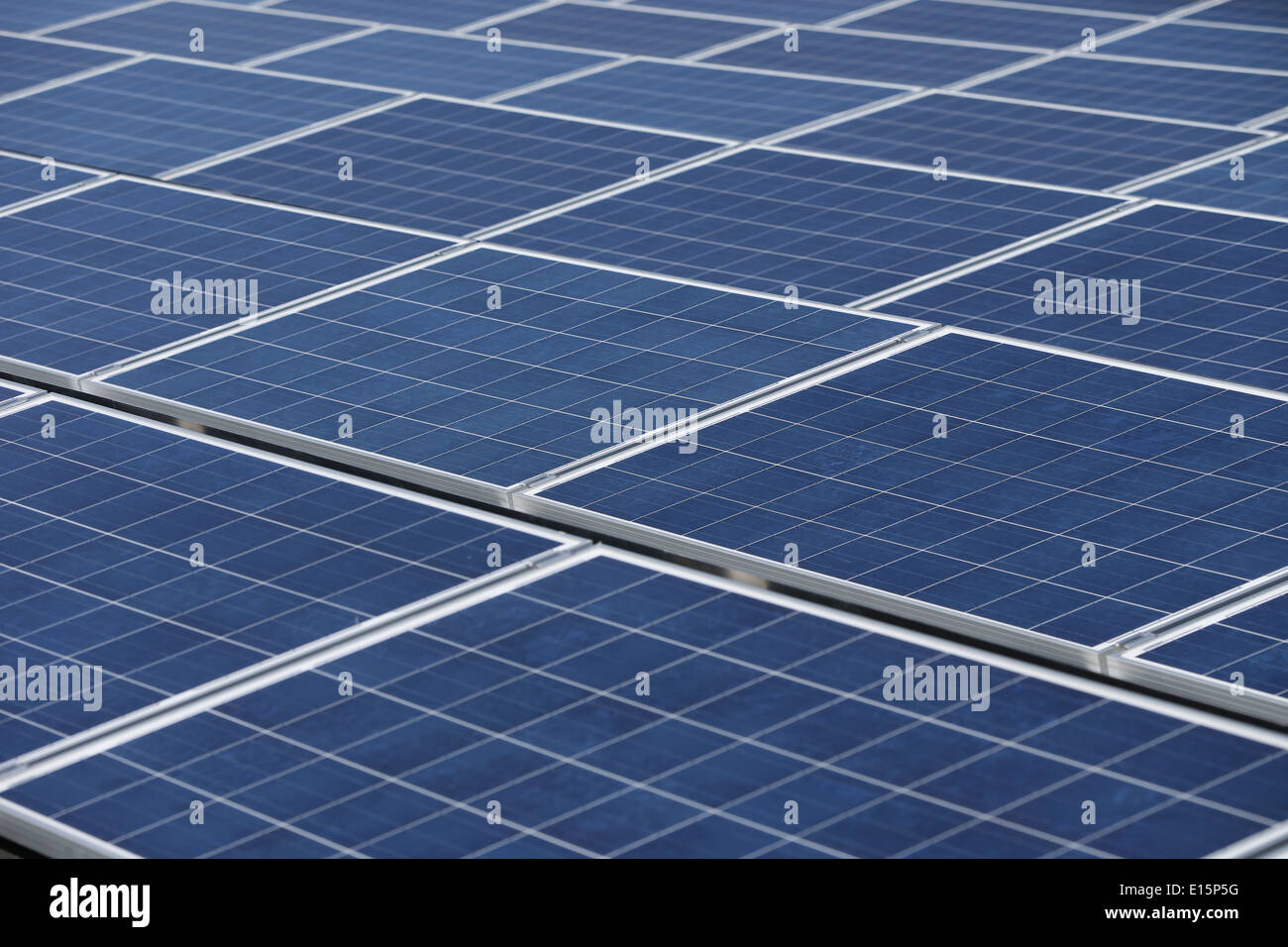 Solar Panels on a flat roof of an office Stock Photo
