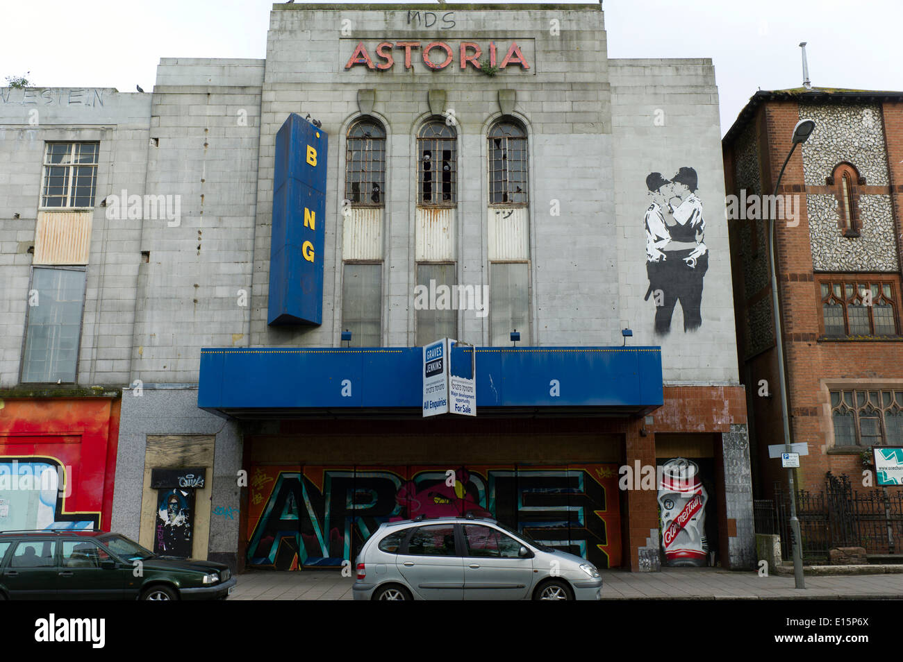 Banksy snogging coppers  brighton, abandoned cinema, Stock Photo