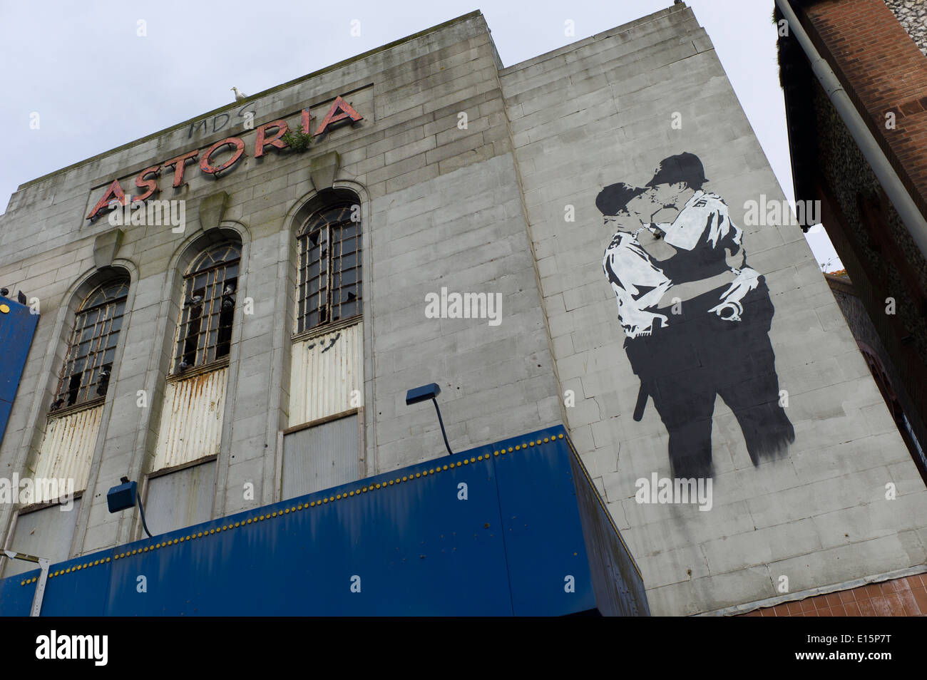 Banksy snogging coppers  brighton, abandoned cinema, Stock Photo