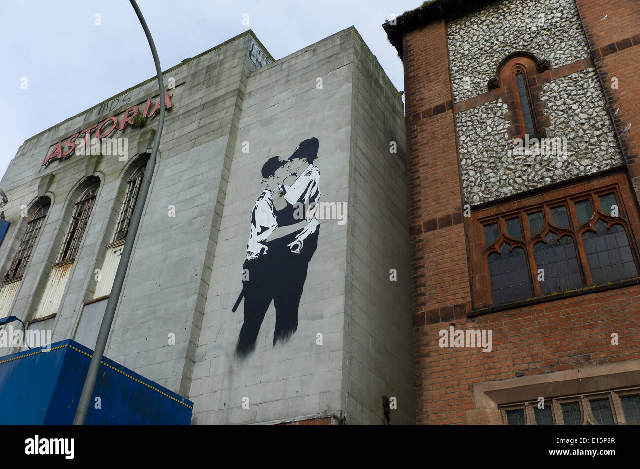 Banksy snogging coppers  brighton, abandoned cinema, Stock Photo