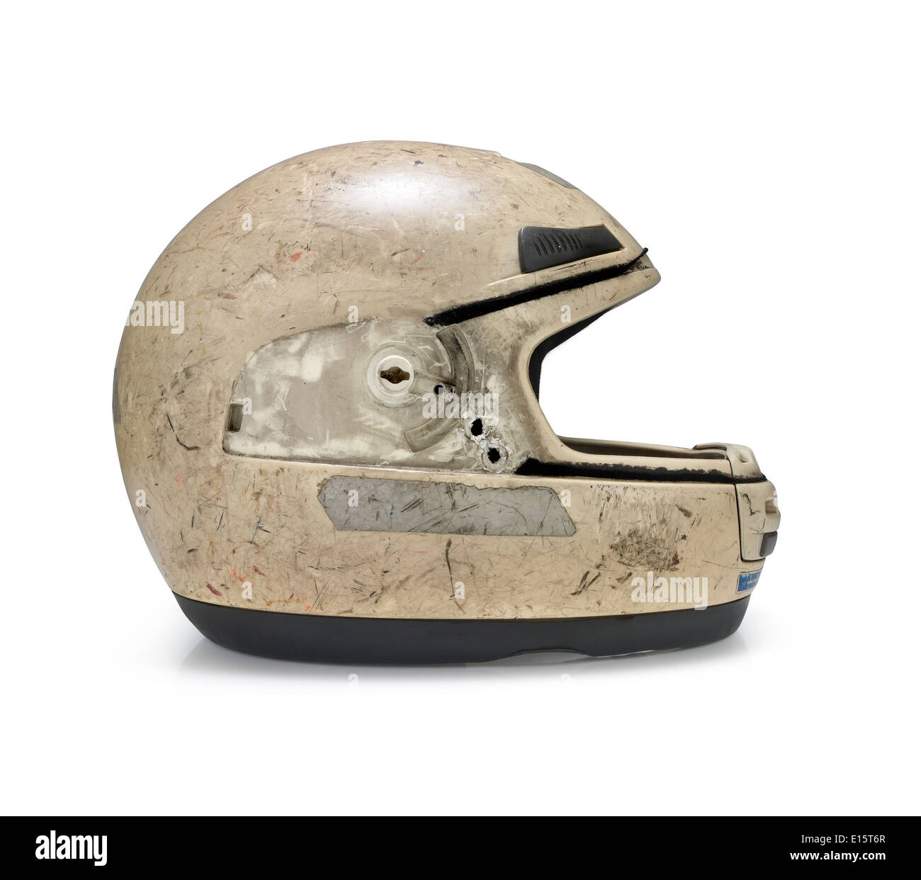 Crashed motorcycle helmet on white background. Clipping path Stock Photo