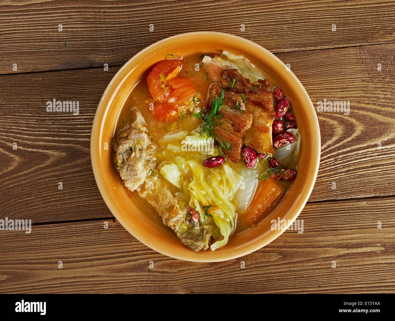 Olla podrida - Spanish stew made from pork and beans, Stock Photo