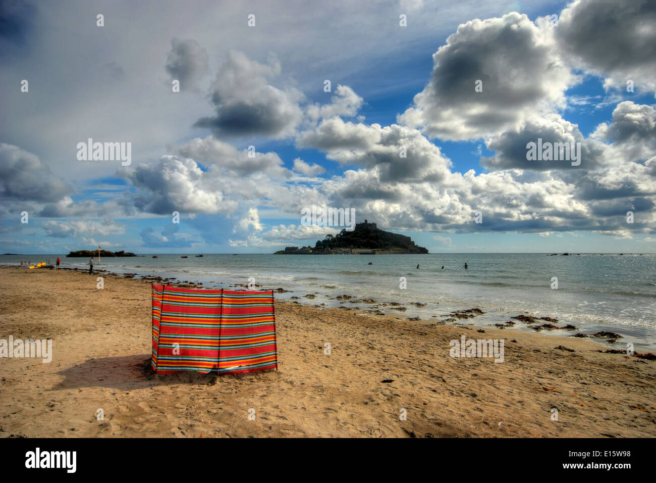 Wind breaker on the Cornish Coast, with St Michael's Mount in the istance Stock Photo