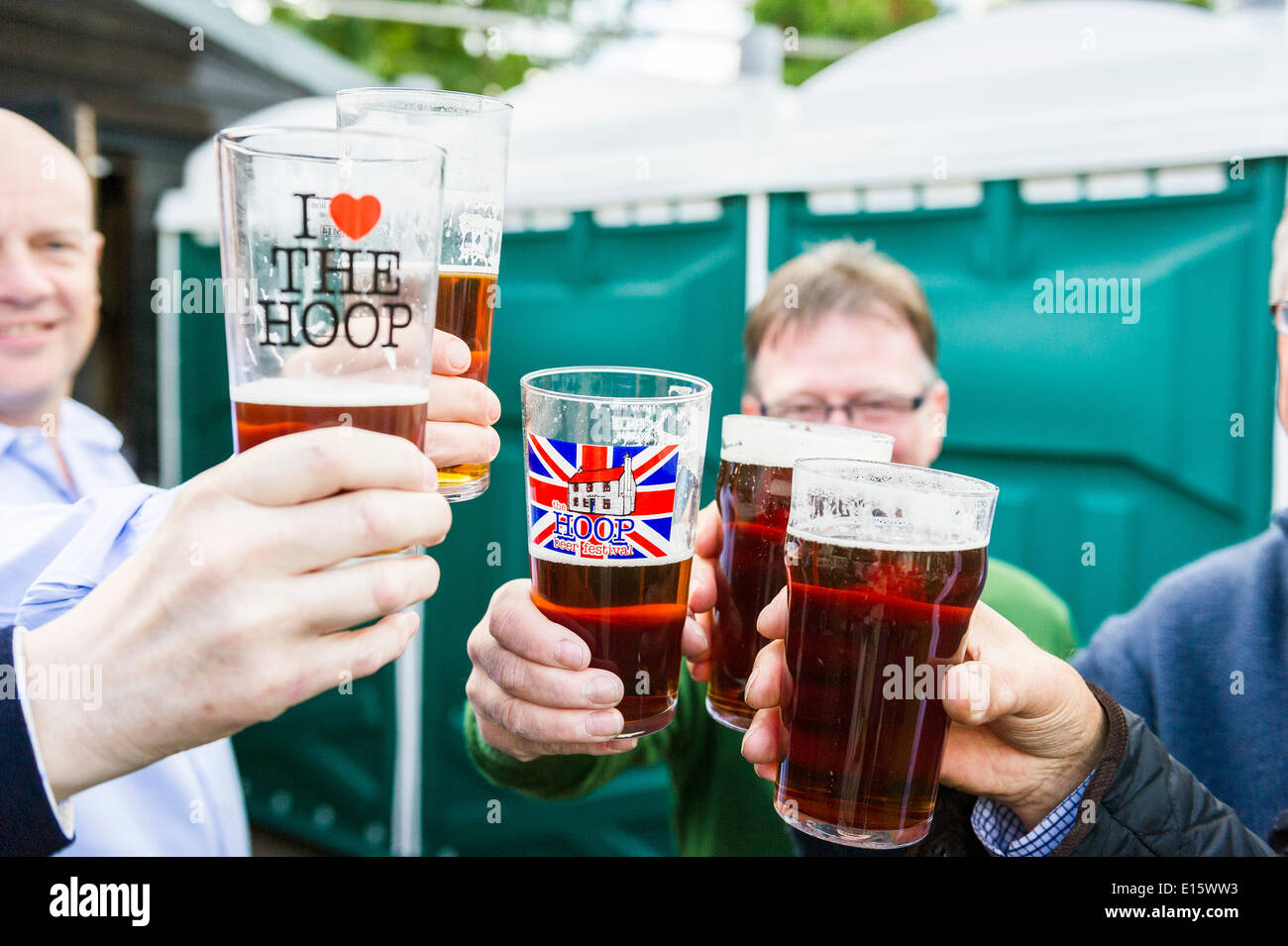 Stock, Essex. 23rd May, 2014.  Real ale fans celebrate the opening day of THE HOOP BEER FESTIVAL, Essex's most famous pub beer festival.  Over the past twenty years, the Hoop beer festival in Stock Village has become an annual event, drawing serious beer supping folk.  Photographer: Gordon Scammell/Alamy Live News Stock Photo