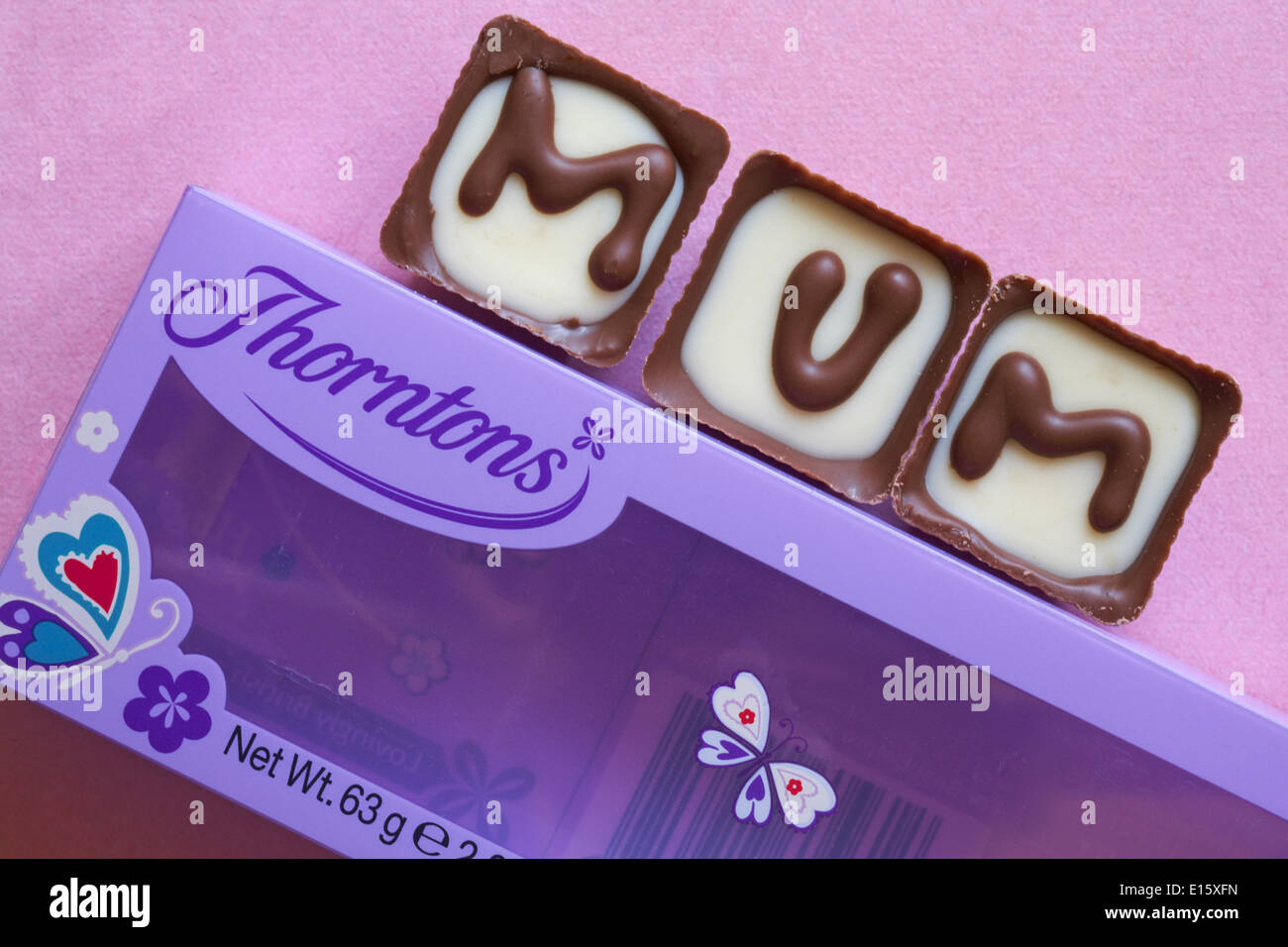 Thorntons Mum chocolates for Mothers Day, Mothering Sunday on pink background Stock Photo