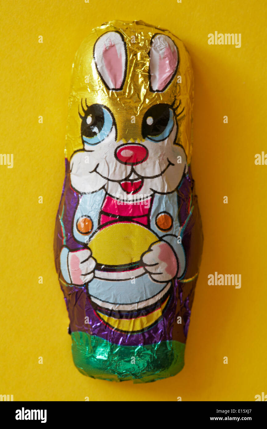 Download Chocolate Foil Wrapped Easter Bunny Isolated On Yellow Background Stock Photo Alamy PSD Mockup Templates