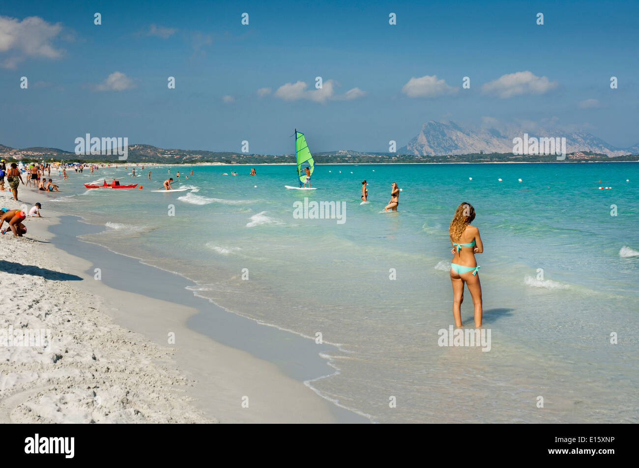 People and tourist enjoy clear water sea at La Cinta beach, San Teodoro, Olbia Tempio province, Sardinia, Italy Stock Photo