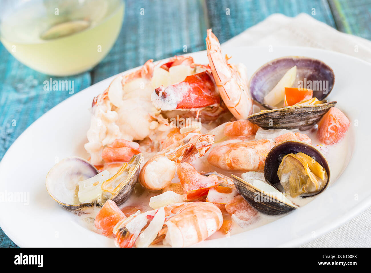 Seafood stew made with lobster, crab, shrimp and clams cooked in ...