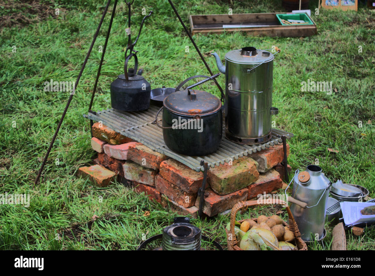 old fashioned cooking pots over an open fire Stock Photo - Alamy